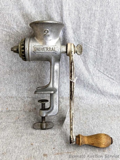 Vintage Universal Manual #2 Food and Meat Grinder. Has original wooden handle and measures approx
