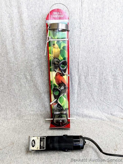 Brand new Droll Yankee bird feeder measures 20" over handle; Oster Small Animal Clipper, model A5.