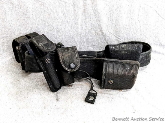 Law Enforcement or Security belt and accessory pouches or pockets, Mini Maglite flashlight. Needs