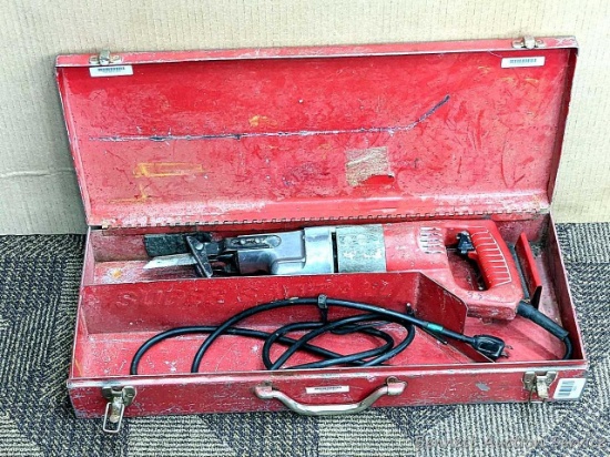 Corded Milwaukee reciprocating saw in metal carrying case. Case measures 24" x 10" x 4-1/2" Saw