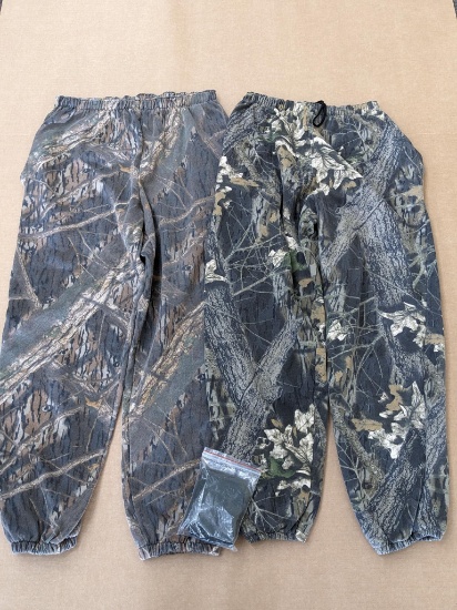 2 pair of camouflage sweatpants, one pair is Mossy Oak and size XL, also incl QuikCamo head net