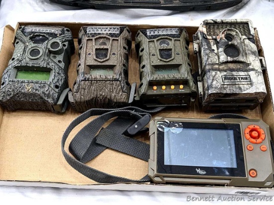 4 Wildgame Innovations and Moultrie game cameras; and Wildgame Innovations SD card reader. Wildgame