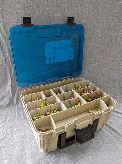 Nice Plano fishing tackle box holds large variety of jigs and jig bodies. Box about 13" x 10" x 6"