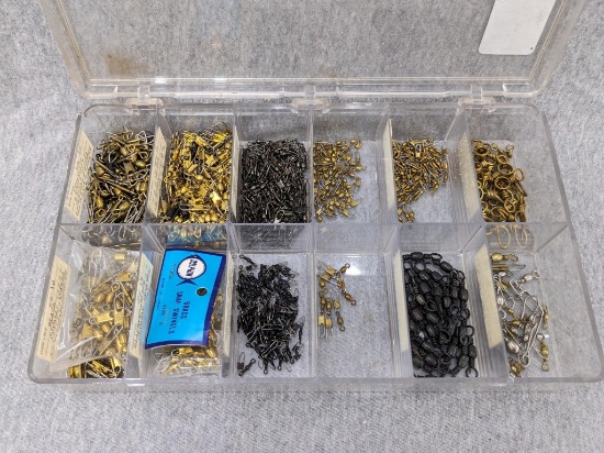 11" x 6-1/2" box of brass and other snap swivels for fishing lures, triple ring pieces, more.