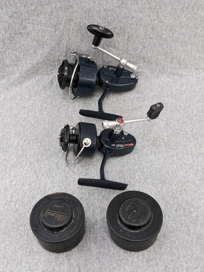 Two vintage Garcia Mitchell spinning fishing reels are No.'s 409 and 404. Both spin and wires flip