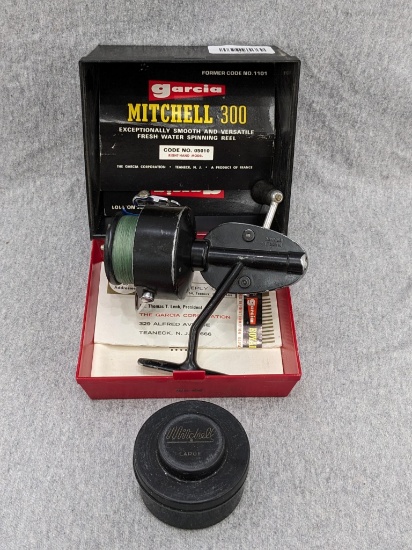 Vintage Garcia Mitchell 300 freshwater spinning fishing reel with original box, packaging, manual.
