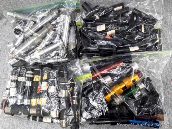 Several bags of fishing rod reel mounts and other pieces. Incl fly rod reel holder and other type.