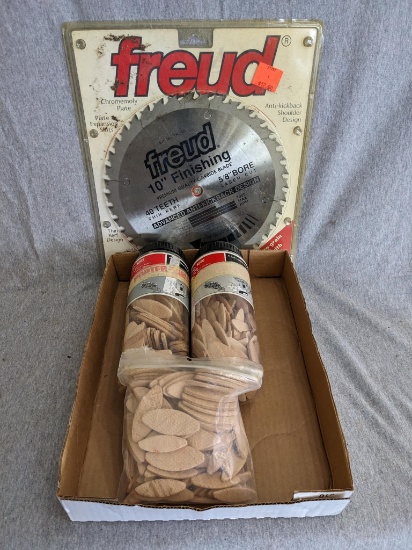 Freud 10" finishing blade and plate joining biscuits. Blade appears NIP and has 40 teeth, 5/8" bore,