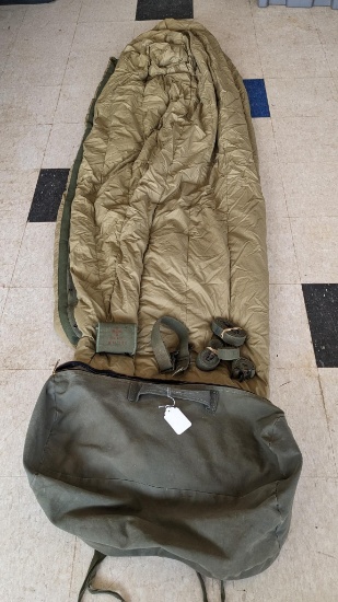 Military duffle bag with U.S. Arctic Large Feather filled mummy sleeping bag, straps and U.S navy