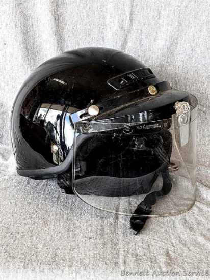 Biker helmet with shield, size S. Includes fabric case. Helmet has some paint imperfections.