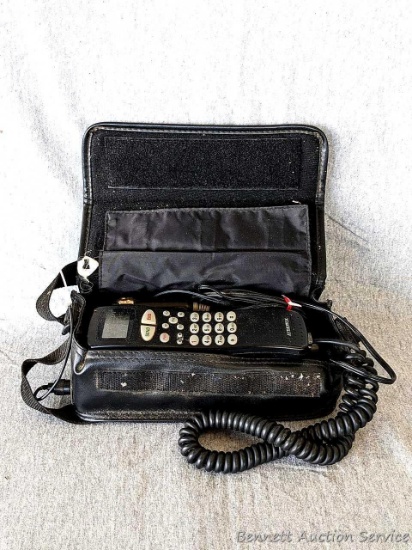 Vintage Audiovox in-car bag phone, model no PRT9200, with charging / power cord. Comes in a handy