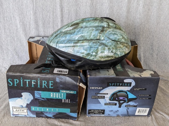 Set of Spitfire Variflex adult bike helmets, appear to be new in boxes and include pads for sizing