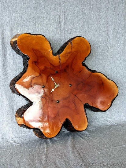 Slab of cedar wooden clock with sawtooth hanger on back. Lighter than anticipated, measures approx