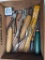 Pin vise and other precision hand tools in a wooden cigar box.