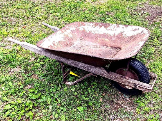 Sturdy wheel barrow has a 3' x 30" wide tub.