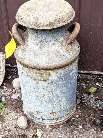 Milk can stands 2' tall and is in good condition.