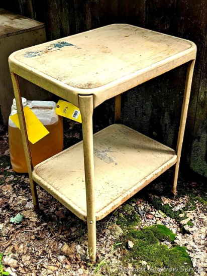 Cute little rolling metal shelf measures 28" high x 22" x 16".