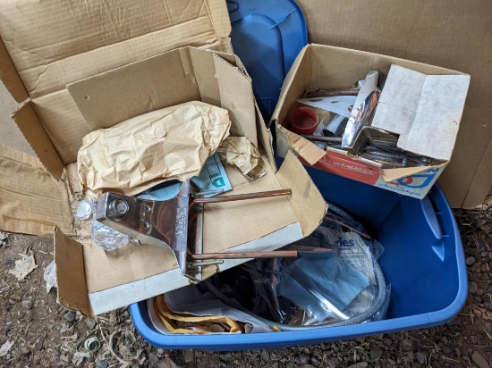 10 gallon tote, plus NIB Delta and Moen vanity and kitchen faucets, more.