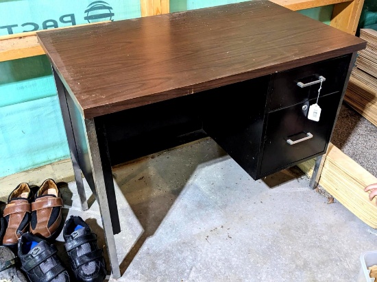 Small metal office desk; measures 40" x 24" x 29-1/2" tall.