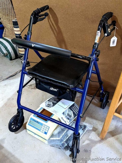 CompuMed automated medication dispenser with manual; and a Drive brand rolling walker. Brakes work,