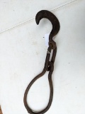 Old log skidding hardware with hand welded rings is over 1-1/2' long.