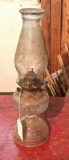 Old oil lamp is nearly 1-1/2' tall and should be an easy clean up.