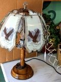 Touch lamp with glass shade with eagles printed on them; measures 21