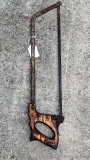 Vintage meat saw is about 28