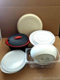 Three piece Pampered Chef colander strainer set with lids; Tupperware divided storage server with