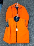 Heavy winter blaze orange hunting coat by Winchester is size XXL; Reversible camo/blaze hunting vest