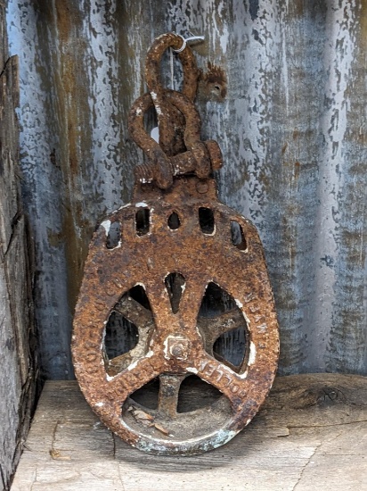 Antique roller bearing pulley is marked Myers & Bro. Ashland, OH 408 and measures approx. 16".