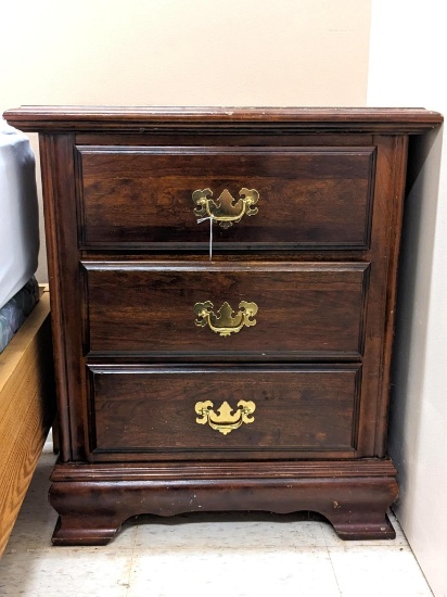 Nice little night stand has three dovetailed drawers and looks to match Lot 41. Measures approx. 27"