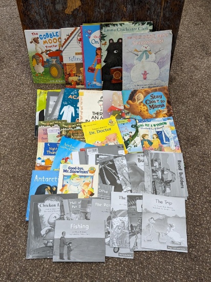 Assorted children's books including how to tell time, Usborne sticker book, story books, more.