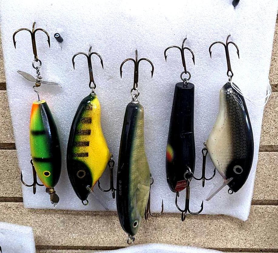 Five fishing lures, largest is 8 long, good for