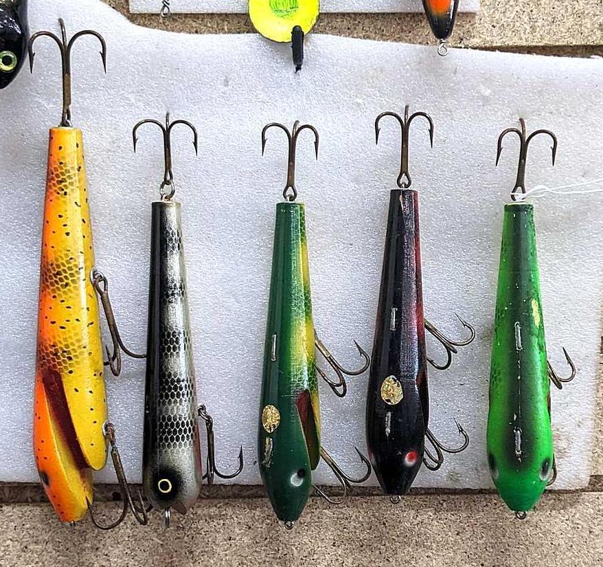 Five wooden fishing lures are all about 8 long
