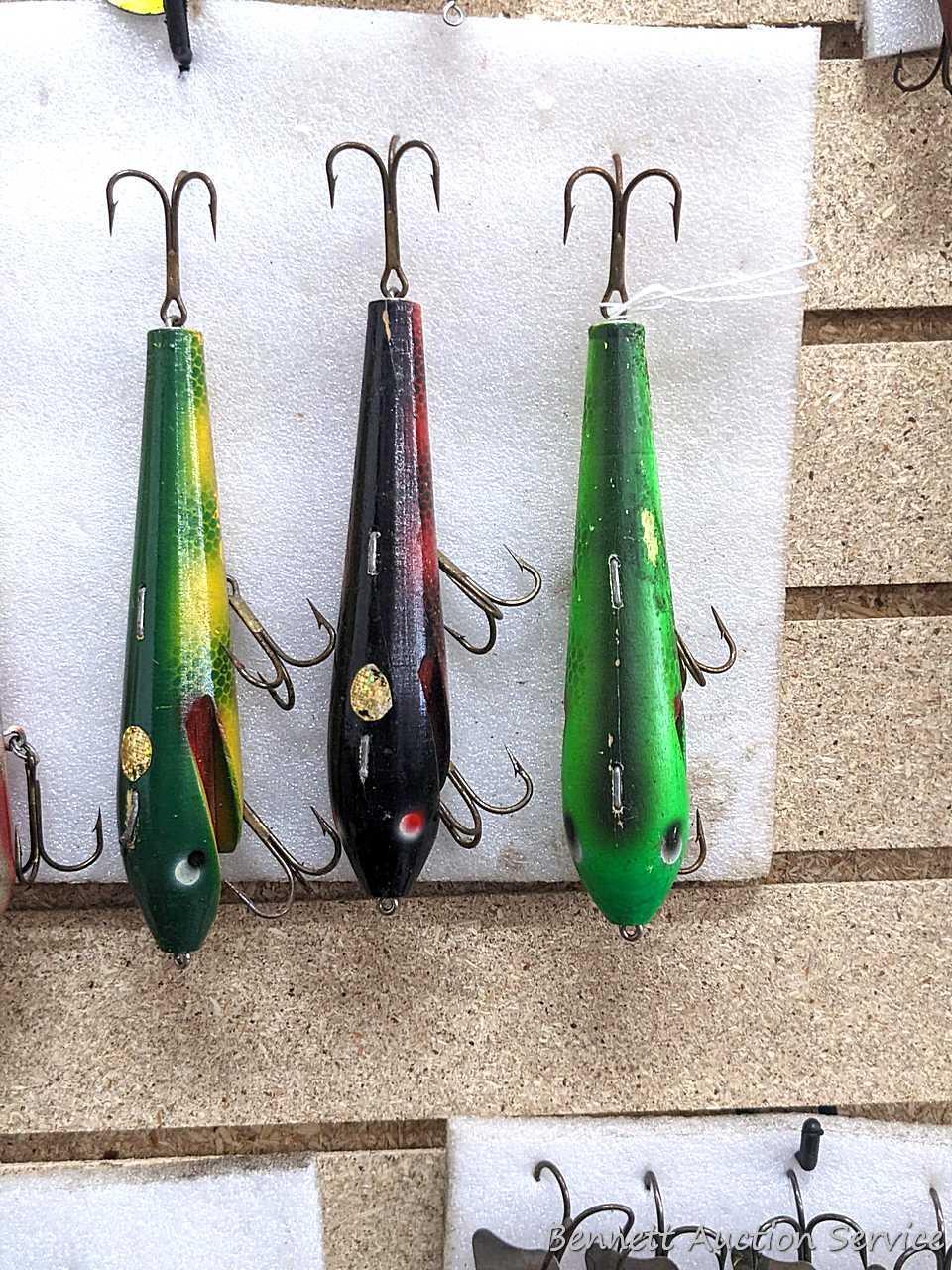 Five wooden fishing lures are all about 8 long