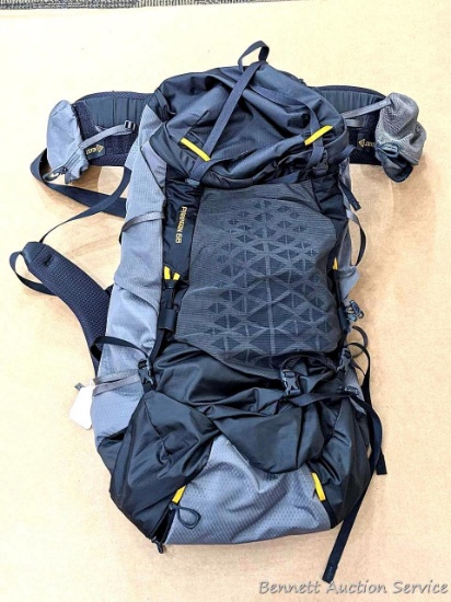 Gregory Paragon 68 outdoor hiking backpack. Measures approx 28" top to bottom. Plenty of pockets for
