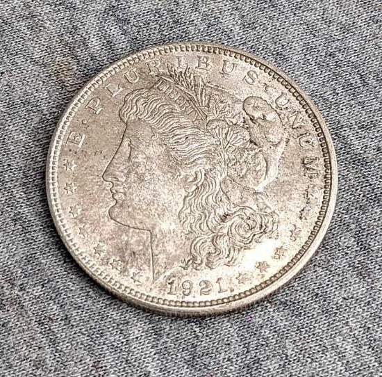 1921 Morgan Silver Dollar. We feel it's an AU grade, take a look at pics.