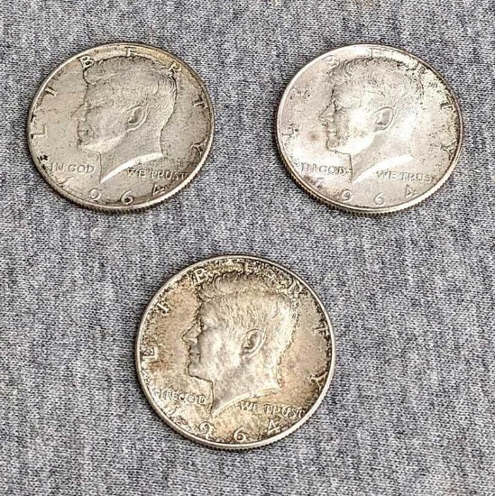 3 Kennedy silver half dollars.