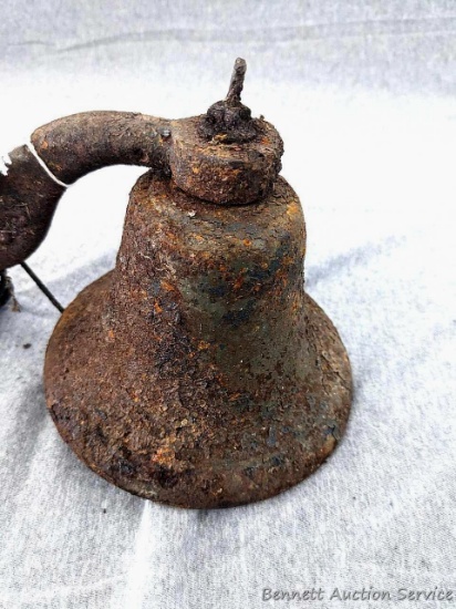 Steal bell measures 5-1/2" in diameter, has a nice ring, and will clean up nicely.