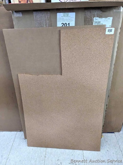 Cork board with a piece cut out; measures 24" x 36" with 12" x 11" cut out of corner, Cork board is