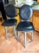 Two sturdy bar stools are both in very good condition and are of a more modern design. Upholstery is