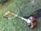 Stihl weed eater is model SF 55, is in good condition, starts and runs good, comes with manual, and