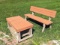 Sturdy 5' wide wooden bench and matching coffee table.
