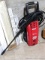 Tradesman H120 power washer with hose and wand. Looks like it's in good condition, about 3' tall.
