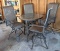 3' diameter glass topped patio table comes with four swiveling stools. All in good condition.