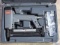 Senco pneumatic nailer with case and manual.