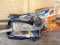 Painting supplies including trays, roller frames & covers, foam brushes; plus a partial bag of Terro