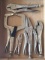Three pairs of Vice Grips and two other pairs of locking pliers.
