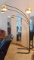 Four light floor lamp stands approx. 7' tall and is approx. 5-1/2' at widest.